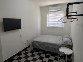 Santafe Suites，位于埃莫西约的酒店