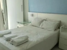 Suíte e Quarto em apto Compartilhado Frente Mar