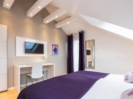 劳拉力士套房酒店