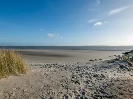 De Strandloper Vakantiehuisje aan het strand - Ferienwohnung am Meer