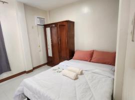 pacific paradise apartment，位于Ubay的酒店