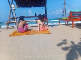 Happy Beach hotel nilaveli，位于尼拉瓦利的酒店