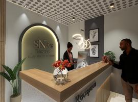 SNR CLOUD9 HOTELs，位于蒂鲁帕蒂的酒店