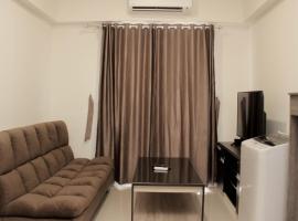 Minimalist and Cozy 3BR at Meikarta Apartment By Travelio，位于芝卡朗的酒店