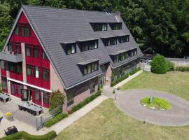 埃尔贝克兰德格德胡伊斯弗莱彻酒店，位于埃尔贝克的酒店