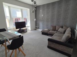 Bellshill Central Apartment，位于贝尔斯希尔的酒店