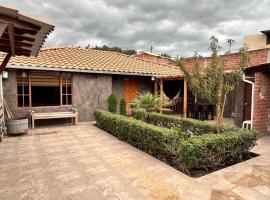 Hogar de Madera，位于Chambo的酒店