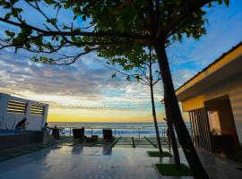 Uno Beach Resort，位于Cayerson的酒店