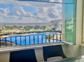 Stunning sunlight apartment with a pool view