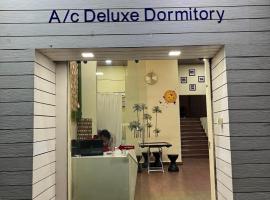 City Stay Deluxe AC Dormitory，位于马尔冈的酒店