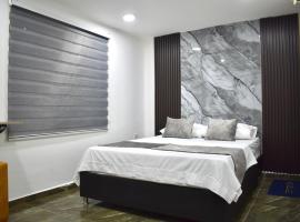 SANTO RIO SUITE Hotel，位于圣玛尔塔的酒店