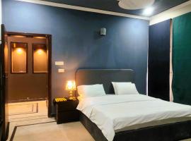 Pinewood Guest House, Islamabad，位于伊斯兰堡的酒店