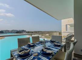 Mágico Oasis en Baia Kristal Vista a la Laguna 2BR，位于Los Arrayanes的酒店