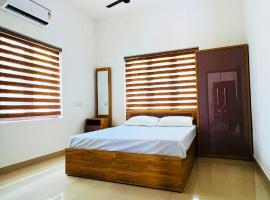 Easy Nest Residency，位于坎努尔的酒店