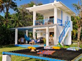 Beach House with AC Surrounded by Nature，位于Moñitos的酒店