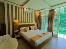 By the stream resort wayanad，位于Padinjarathara的酒店
