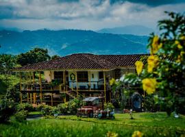 Alojamiento campestre Finca hotel el paso，位于马尼萨莱斯的酒店