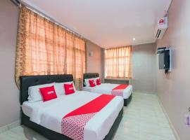 Super OYO 89348 Rg Motel，位于樟仑的酒店