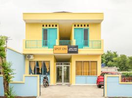 OYO Life 1889 Mbuahpage，位于Telukjambe的酒店