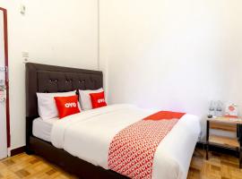 OYO 1874 Joh - Je Guest House，位于Sunggal的酒店