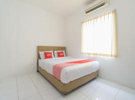 Super OYO 2110 Rotterdam Guest House，位于当格浪的酒店