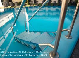Sonnenstube - Westbalkon, Ruhige Lage, Sauna, Pool, Seenähe, Dachterrasse，位于默讷塞的酒店
