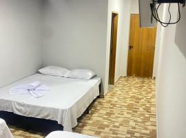 Pousada Sagrada Devoção，位于阿帕雷西达瓜拉廷桂塔机场 - GUJ附近的酒店