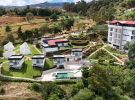 Hotel PAUCHÉ Topiario Zapatoca，位于萨帕托卡的露营地