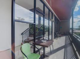OYO 90312 Bahu Bay Hotel，位于美娜多的酒店
