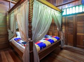 OYO Home 90256 Rb Beach Homestay，位于Kampong Tanjong Dahan的酒店