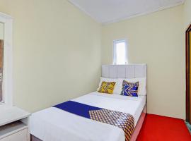 SPOT ON 90698 Delfi Homestay Syariah，位于迪昂的酒店