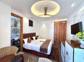 Check inn homes，位于瑞诗凯诗Dehradun Airport - DED附近的酒店