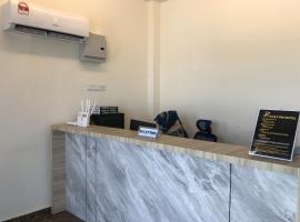 OYO 90506 Z Stay Inn Hotel，位于居銮的酒店