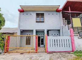 SPOT ON 91828 Homestay Dinda Syariah Near Masjid Al Amin，位于Parit的酒店