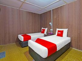 OYO 90675 Holiday View Inn，位于而连突的酒店