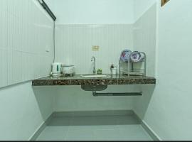 OYO HOME 90692 Tok Babah Village Homestay，位于Kampong Sungai Mati的酒店