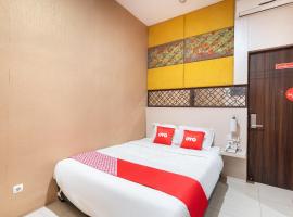 Super OYO Flagship 91863 Metro House，位于Putat-wetan的酒店