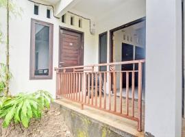 OYO 92964 Kost 99，位于美娜多的酒店