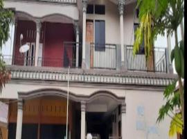 SPOT ON 93375 Elang Homestay，位于Parit的酒店
