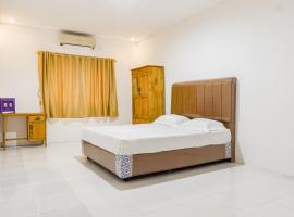 OYO 93388 Enjoy Homestay & Cafe，位于Sungguminasa的酒店