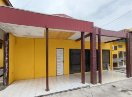 OYO 93521 Wisma Flamboyan NearTaman Makam Pahlawan，位于Rantau的酒店