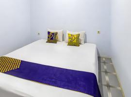 SPOT ON 93511 Rinjana Homestay，位于丹戎的酒店