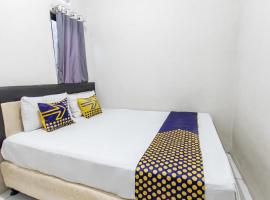 SPOT ON 93510 Penginapan Melati Tanjung Near Kantor Pengamat Pengairan Tanjung，位于Papak的酒店