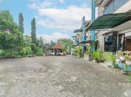 OYO 94148 Forzando Hotel，位于Blimbing的酒店