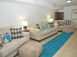 Oceanfront Bliss: 3-Bedroom, Pools & Peloton bike!