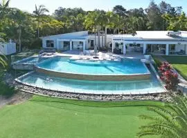 Lake Palm Resort Luxury Retreat absolute Waterfront on 3 acres at Lake Macquarie.