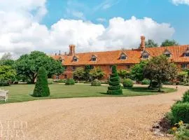 A Luxury Tudor Hall & Gardens Located on Breath-Taking Norfolk Estate