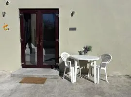 Private Detached Small Bedroom and Bathroom Only- This is not an apartment- No clothes storage- no cooking facilities