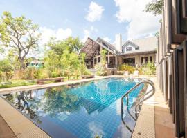 Capital O 75378 Thawapee Resort，位于罗勇的酒店