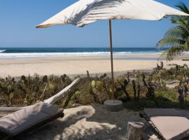 Cabanas Adobe Frente Al Mar，位于埃斯孔迪多港的酒店